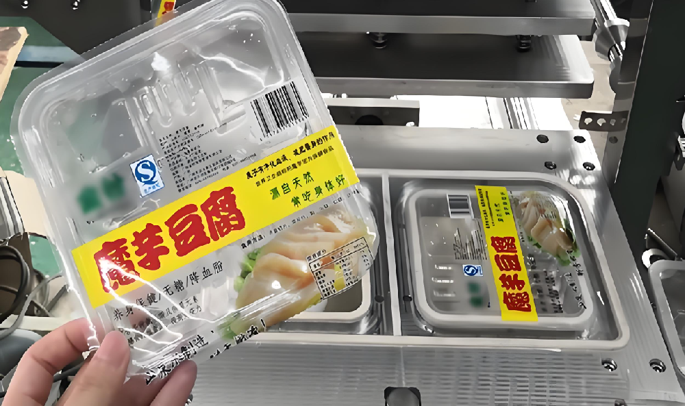 龍應(yīng)一出三魔芋豆腐灌裝封口機(jī)