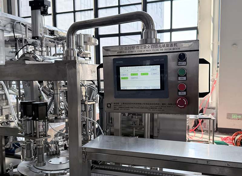 2頭自立袋充填旋蓋機